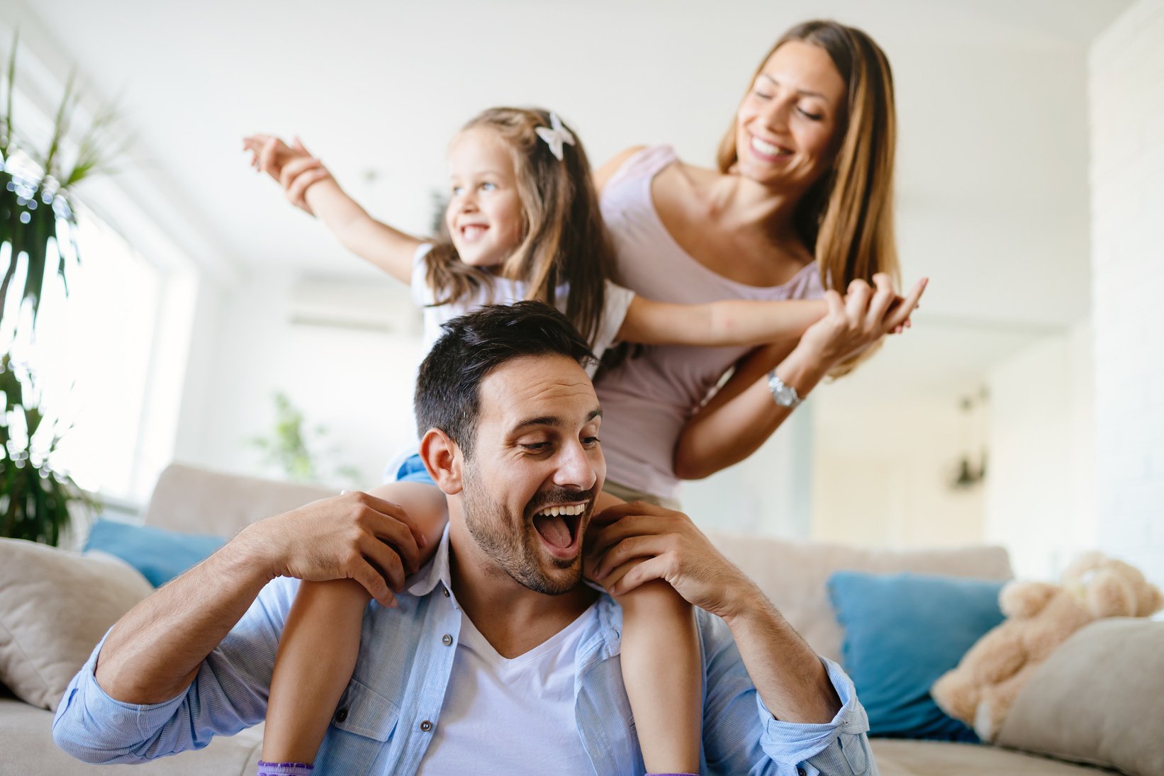 Happy family having fun times at home