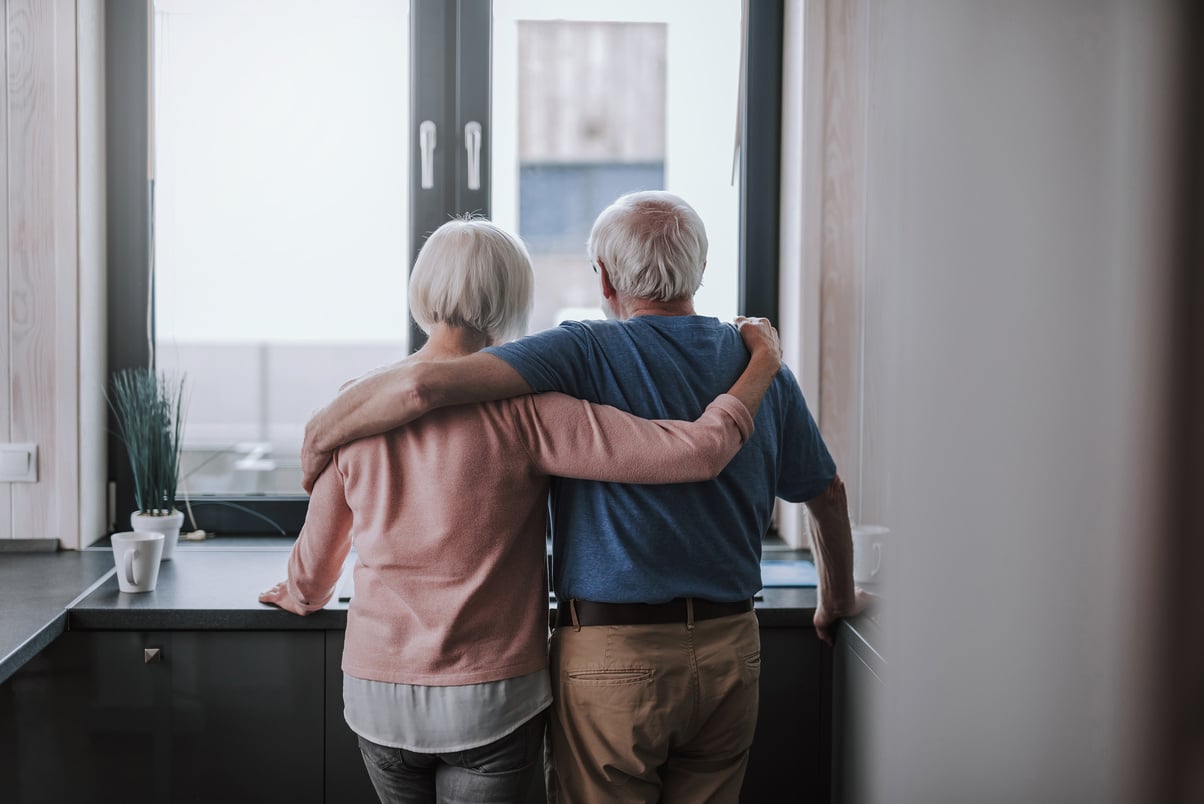 Back side elder couple enjoying being together